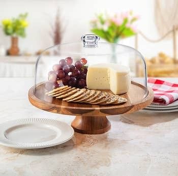 Just 29 Of The Prettiest Kitchen Products Around Cake Plate With Dome, Cake Stand Set, Footed Cake Plate, Wood Cake Stand, Cake Stand With Dome, Cake Platter, Willow Wood, Wood Cake, Pretty Kitchen