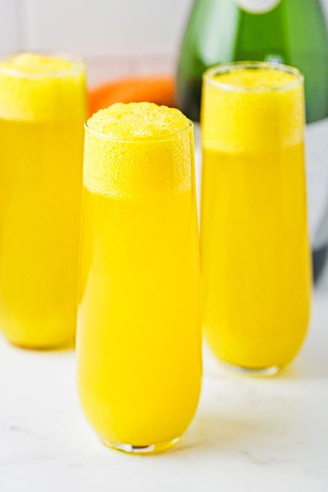 These mango mimosas are a fun variation of the classic mimosa, using mango instead of orange juice. Add some sparkling wine and you have a delicious brunch cocktail. Mango Mimosa Recipe, Mango Mimosa, Classic Mimosa, Mimosa Recipe, Mango Puree, Brunch Cocktails, Champagne Cocktail, Tropical Escape, Sparkling Wine