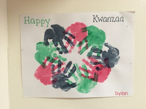 Easy Kwanzaa hand print wreath! Toddler Kwanzaa Crafts, Kwanzaa Handprint Craft, Kwanza Crafts Toddlers, Kwanzaa Crafts For Infants, Kwanza Crafts For Toddlers, Kwanza Art For Toddlers, Kwanzaa Crafts Preschool, Holidays Around The World Crafts Preschool, Kwanzaa Art For Toddlers