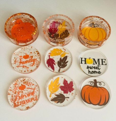 Fall Resin Coaster Set of 4 with Matching Coaster Holder _ Unique Fall Coasters _ Autumn Coasters _Thanksgiving Coasters Fall-themed coasters with pumpkins, leaves, and Family, Home sweet home, and Blessed & Thankful messages. | Sky Rye Design Christmas Resin Coasters, Thanksgiving Coasters, Fall Coasters, Diy Resin Coasters, Resin Coaster, Round Coasters, Coaster Holder, Unique Fall, Epoxy Resin Crafts