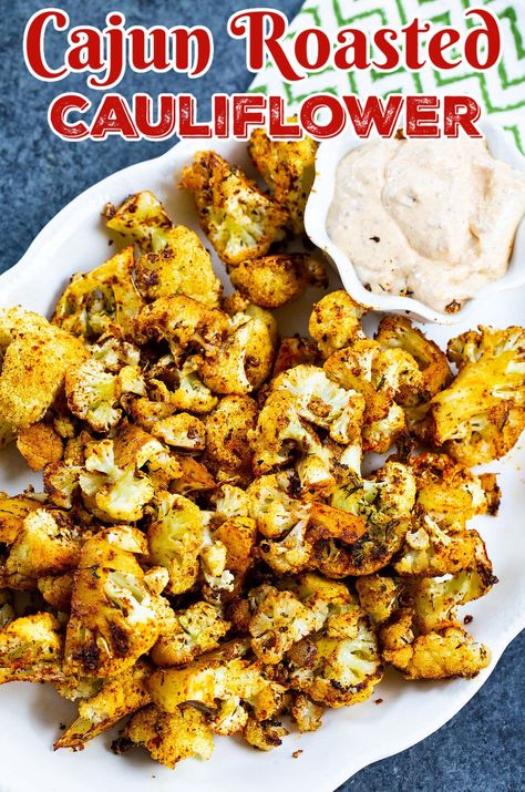 Cajun Roasted Cauliflower Cajun Vegetables Side Dishes, Cajun Cauliflower, Spicy Roasted Cauliflower, Spicy Southern Kitchen, Roasted Cauliflower Recipes, Spiced Cauliflower, Flavored Olive Oil, Remoulade Sauce, Roasted Vegetable Recipes