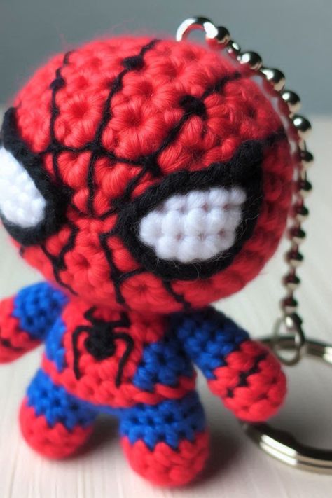 Create a crochet Spider Hero keychain with this fun and easy tutorial. Perfect for fans of the iconic superhero or as a cute gift idea! Deadpool Crochet Keychain, Spiderman Free Crochet Pattern, Spiderman Crochet Keychain, Crochet Spiderman Free Pattern, Marvel Crochet Patterns Free, Crochet Spiderman Keychain, Keychain Amigurumi Free Pattern, Spiderman Crochet Pattern Free, Crochet Keychains Patterns Free