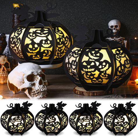 PRICES MAY VARY. Creative Halloween Decor Material: our Halloween pumpkins table centerpieces lantern is created from black paper material, giving it a sleek and spooky appearance; The combination of the opulent black color and the unusual paper texture, making it a spooky yet stylish addition to your Halloween decor Intriguing Design and Size: no ordinary lantern, this paper lantern boasts an arresting design featuring a round base of approximately 6.57 inches, pumpkin wedges measuring roughly Halloween Table Decorations Party, Paper Jack O Lantern, Halloween Wedding Centerpieces, Halloween Party Centerpieces, Pumpkin Table Centerpiece, Lantern Table Centerpieces, Pumpkin Tablescape, Lanterns Paper, Lanterns Light