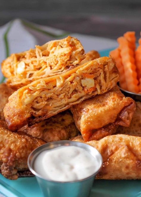 Buffalo Chicken Egg Rolls are two of our favorite appetizer recipes in all wrapped up into one dippable delight. Buffalo Chicken Egg Rolls, Easy Buffalo Chicken, Reheat Chicken, Chicken Egg Rolls, Chicken Spring Rolls, Egg Roll Recipes, Chicken Dips, Wontons, Buffalo Chicken Dip