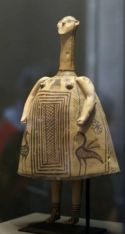 The technique, typology, and decoration of this figurine, known as a "bell idol", identify it as the work of Theban potters of the Late Geometric period, in ancient Boeotia. Although strictly an item of pottery, it is a rare example of figurative sculpture from the period, probably representing a Nature goddess - a descendant of the Minoan tradition, which some commentators have identified with Artemis. Figurines of this type are found in tombs and may have been used during funeral ... Paper Sculpture Art, Minoan Art, Ancient Greek Pottery, Goddess Sculpture, Greek Pottery, Traditional Pottery, Ancient Pottery, Prehistoric Art, Ancient Sculpture