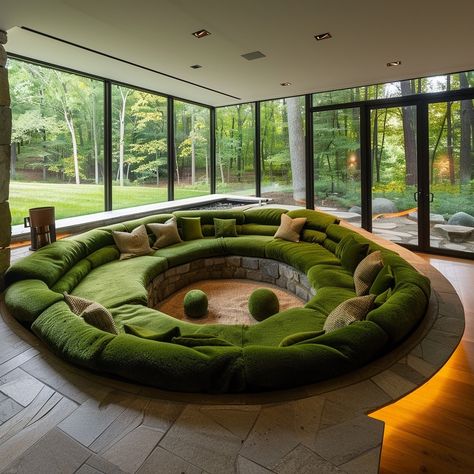 The Moss Meadow Conversation Pit is a serene, cozy space inspired by the tranquility of a lush meadow. Featuring moss-green upholstery, natural wood accents, and earthy tones, it offers a comfortable and immersive retreat for intimate conversations and relaxation. Conceptual AI Art Follow @ecosapiens for more! Conversation Room Ideas, Conversation Pit Living Room, Minecraft Cave House, Solarium Room, Hold The Vision, Minecraft Base, Natural Wood Accents, Conversation Pit, Green Upholstery