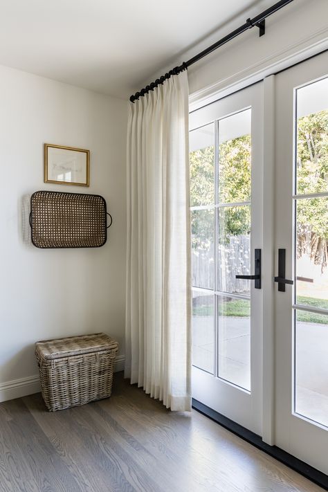 Doors With Curtains French, Furniture In Front Of French Doors, Sheer Curtains French Doors, Curtains On Back Door, Back Door Drapes, Bedrooms With Patio Doors, Dining Room Door Curtains, Living Room Door Curtains Ideas, Living Room With Sliding Door Decor