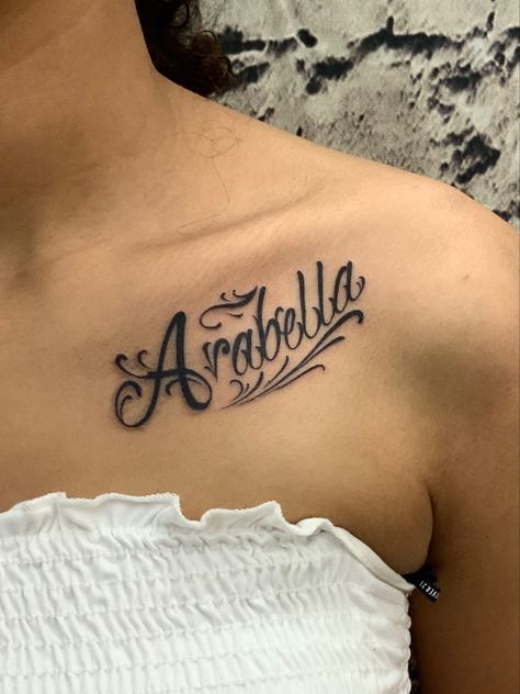 Cute Name Tattoos For Women Chest, Name Tattoo On Collarbone, Name On Collar Bone Tattoo, Collar Bone Tattoo Name Fonts, Names On Collar Bone Tattoo, Tattoo Name Placement For Women, Name On Chest Tattoo Female, Collar Bone Tattoo Name, Name Tattoos On Chest