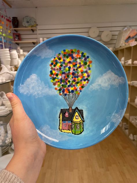 This UP plate is amazing!  We love when people reference films, tv shows or songs in their paintings! Its lots of fun for us too as we can spot all the references we know!  What film, tv show or song would you paint pottery inspired by?  Book your session: www.mycraftymonkey.com/bookings  #potterypainting #pyop #potterypaintingstudio #paintyourownpottery #stneots #cambs #cambridgeshire #creativeactivities #huntingdonshire #thingstodocambs #creativethingstodo #creativedaysout Pottery Painting Ideas For Men, Disney Ceramics Ideas, Disney Pottery Painting Ideas, Creative Space Keramik, Disney Ceramics, Disney Pottery, Paint Clay, Disney Plates, Disney Night