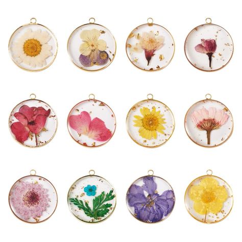 PRICES MAY VARY. 🏵️【Package Included】Coming with totally 12pcs round dried flower resin pendants in 12 different styles, such as daisy, sunflower, plum blossom, peach blossom and other vibrant styles, so that you can definitely find your favorite one. 🏵️【Floral Design】Natural dried pressed flower in the pendants and the flower grew in different shapes, can be bringing you a nice gift from nature. It's very beautiful for DIY Jewelry making. 🏵️【Size】Colorful flower pendants in 12 styles, the si Gratitude Ideas, Bead Frames, Pressed Flower Resin, Resin Pendants, Transparent Flowers, Transparent Resin, Flower Resin, Beading Needles, Jewelry Beads