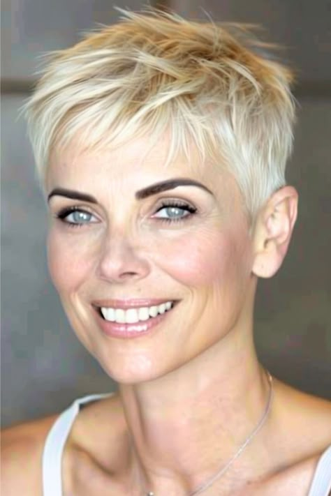 This cropped pixie cut is the epitome of edgy sophistication with its choppy layers that add volume and texture to fine hair.  Click here to see more stunning short hairstyles for women over 50 with fine hair. Short Cropped Hair, Short Spiked Hair, Crop Hair, Very Short Haircuts, Short Hair Pixie Cuts, Twitter Artist, Messy Short Hair, Super Short Hair, Follow Tiktok