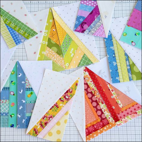 This pdf pattern contains 4" x 8" Scrappy Half Rectangle Triangle (HRT) foundations. These paper-pieced Scrappy HRTs are the perfect scrap buster!  They are a ton of fun to piece and can be used in a quilt, wall hanging, bag, or more! The Scrappy Half-Rectangle Triangles are foundation paper-pieced and the digital pdf pattern includes: - (50) 4" x 8" Scrappy HRT foundations, 25 left- and 25 right-facing - Instructions on how to construct and use the Scrappy HRTs - A page of layout ideas to get y Half Square Triangle Quilts Pattern, Bright Quilts, Paper Pieced Quilt Patterns, Scrap Fabric Crafts, Paper Pieced Quilt, Foundation Piecing, Quilling Patterns, Colorful Quilts, Triangle Quilt