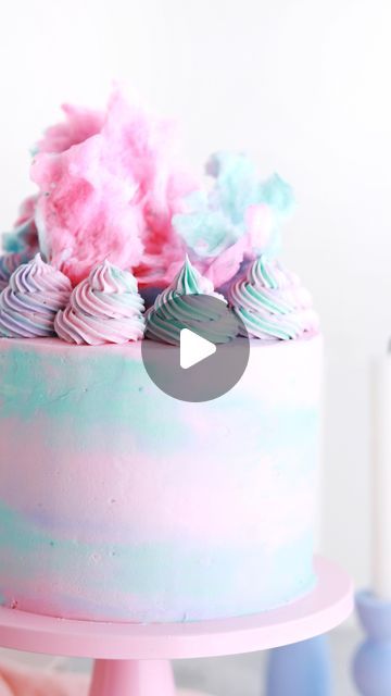 Whitney DePaoli | Sugar & Sparrow on Instagram: "Watercolor buttercream + these cotton candy colors 😍✨this frosting technique is so satisfying and works in pretty much any color palette:⁣ ⁣ 1. Frost your cake with a background color (mine is pink), then chill the cake for about 20 minutes to let the frosting firm up.⁣ 2. Add blobs of different colored buttercream all over the cake, then use an icing smoother to blend them together as you smooth them down. ⁣ 3. Add more colored buttercream to fill in any gaps.⁣ 4. Continue smoothing until you have the dreamiest watercolor finish. ⁣ ⁣ I finished this cake with sharp edges, a swirl border with @wiltoncakes Tip 4B, and fluffy cotton candy. If you want it to taste like cotton candy too, I’ve got the full recipe for this Cotton Candy Cake at su Swirl Icing Cake, Cotton Candy Cake Decoration, Cotton Candy Cake, Swirl Border, Cotton Candy Cakes, Pop Cakes, Frosting Colors, Frosting Techniques, Swirl Cake