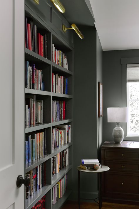 We LOVE a dark and moody room! We are obsessed with how our client's space turned out! We used Benjamin Moore's Knoxville Gray, a gorgeous dark green gray, for the walls, trim, and built-in bookshelves to keep things feeling elevated and rich! Dark Pewter Benjamin Moore, Knoxville Gray, Moody Home Office, Pewter Benjamin Moore, Moody Room, Moody Home, Elevated Home, Dark Pewter, Dark And Moody