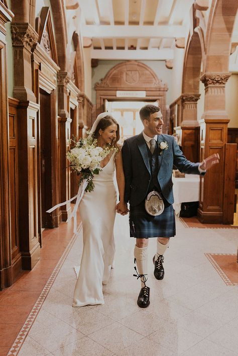 Happy bride and groom at Pollockshield Burgh Hall in Glasgow. Bride carrying white wedding bouquet, wearing simple & elegant Savannah Miller wedding dress. Groom in a kilt. Groom Kilt Wedding, Wedding Kilts Grooms, Groom Kilt, Wedding Kilt, Kilt Wedding, Wedding Dress Groom, Savannah Miller, Glasgow Wedding, Glasgow City Centre