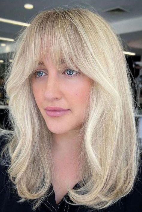 56. Blonde Bardot Vibe From Dakota Johnson, Priyanka Chopra, Hilary Duff, Camila Cabello, Jennifer Lopez, and many more…these celebrities that rocked the curtain bangs... Bright Blonde Hair Curtain Bangs, Blonde Long Bob With Curtain Bangs, Celebrities With Bangs, Curtain Fringe Long Hair, Blonde Hair With Curtain Bangs, Blonde Lob With Bangs, Wispy Curtain Fringe Long Hair, Fringe Long Hair, Lived In Blonde Hair