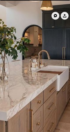 Wood Island With Gold Hardware, Modern Kitchen Flooring Tile, No Hood Kitchen, Wood Island White Kitchen, Thick Marble Countertop, Kitchen Trends 2024 2025, Light Oak Kitchen Cabinets Modern, Sivan Ayla Kitchen, Non White Countertops