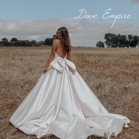 Subtle Princess Wedding Dresses, Wedding Dress Large Bow On Back, Wedding Dress With Front Bow, Simple Elegant Wedding Dress With Bow, Backless Princess Wedding Dresses, Bridal Gown With Bow, Elegant Wedding Dress Backless, Feminine Classic Wedding Dress, Silk Bow Wedding Dress