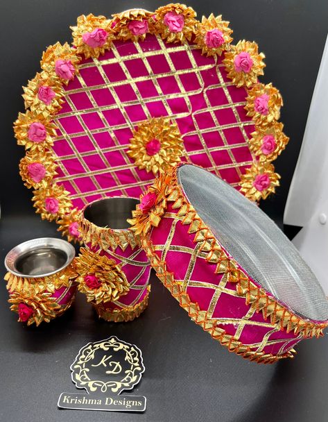 Colorful & Vibrant Rose Decorative Karwa Chauth Thali Set| Thali, Channi, Small Kailash, Glass| Gota Patti Decorations. Perfect gift for daughters, daughter in law, or new brides. Traditional Pooja Thali. Magneta Gota Patti KarwaChauth Thali Set Enjoy the traditional ritual of Karva Chauth by bringing home this beautifully decorated Thali Set. This set is absolutely elegant and will add more charm to your special day during this festive season. Bring in shine to your auspicious day and celebrate Karwachauth Decoration Ideas, Karva Chauth Decoration Ideas, Karwa Thali Decoration, Karwa Chauth Decoration Ideas, Karvachauth Thali Decoration, Karwachauth Thali Decoration Ideas, Karwachauth Thali Set, Karva Chauth Thali Decoration, Kansar Thali Decoration For Marriage