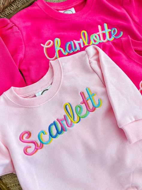 Girls puff sleeve sweatshirt personalized with  name, monogram, and/or motif t in your choice of font and color(s)!       100% Cotton    Naturally Tapered Puffed Shoulder    True to Size    Ribbed Neckline **FOR MORE OPTIONS VISIT https://bogeyandbyrd.com Diy Name Embroidery Sweatshirt, Monogram Sweatshirt Ideas, Preppy Fonts, Crew Neck Sweatshirt With Name Print, Rainbow Letter Print Crew Neck Top, Embroidered Name Sweatshirt, Etsy Sweatshirts, Playful Multicolor T-shirt With Name Print, Name Sweatshirt