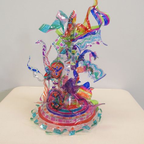 My 'Chihuly' style plastic sculpture. Sharpie on recycled plastic, melted with a heat gun then hot glued together. So much fun!!! Melted Plastic Sculpture, Recycled Materials Sculpture, Plastic Sculpture Art, Melting Plastic Art, Sculpture Using Recycled Materials, Melted Plastic Art, Acetate Art, Melting Plastic, Recycled Sculpture