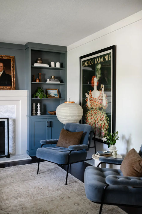 Whether it's a blue living room, bedroom, or kitchen you're looking at, De Nimes by Farrow & Ball is a great choice - it's a lovely tone that is the mid-point between blue and grey. The color isn't a typical deep blue that can sometimes overwhelm. This tone is the right balance between light and dark

Image credit: Yond Interiors Heritage Paint Colours, Farrow And Ball Living Room, Green Grey Paint, Farrow And Ball Paint, Dining Room Wall Art, Blue Paint Colors, Grey Paint Colors, Farrow And Ball, Stylish Living Room