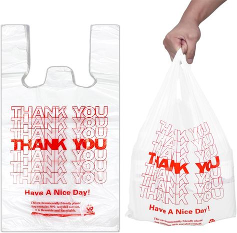 WHITE PLASTIC SHOPPING BAGS-Provide your customers with a convenient way to carry purchased merchandise by bagging items in this green large thank you bag. It’s versatile enough for use with food or retail items. Available color in GREEN 100Pcs,300Pcs, WHITE 100Pcs,300Pcs, BLACK 100Pcs,300Pcs, RED DESIGN 100Pcs,300Pcs. THICKER & STURDY- Our thank you bag is made from high-density polyethylene, this bag is built strong to resist rips and tears while in use. Measuring 13 microns thick, this large bag is versatile enough for use with food or retail items. It boasts a translucent, white color and features a courteous, printed, red graphic on the front that will show guests that you care. CONVENIENT TO CARRY-Bags come in bulk, pack of 100ct. Sturdy plastic handles, easy to use and comfortable f Shopping Bags Design, Shopping Bag Design, Thank You Bags, Plastic Shopping Bags, Merchandise Bags, Grocery Shopping Bags, T Shirt Bag, Tshirt Bag, Shirt Bag