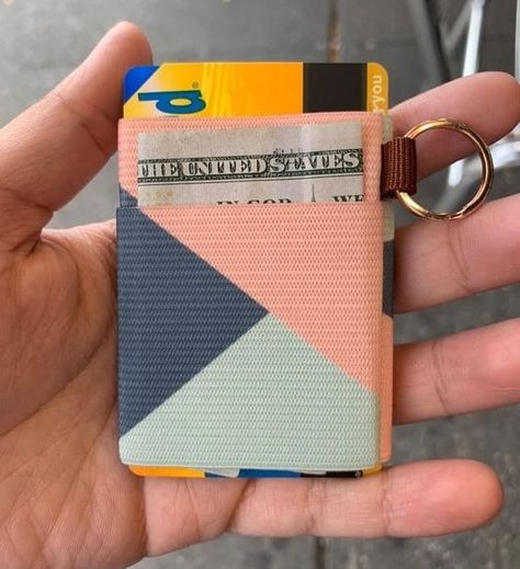 Promising review: "My sister has used these in the past and I thought they were cool. I switched my phone case from one with a wallet to a regular one and got this thread wallet with lanyard to wear to a concert so I wouldn’t need to carry a purse. It was seriously the best decision ever. It holds my cards tightly and I don’t have to worry about them falling out. I also used a big bundle of cash and it hasn’t stretched out! That would have been a huge deal breaker and it has passed the test." —M Thread Wallets, Lanyard Wallet, Cute Lanyards, Diy Clutch, Cheap Things, Purple Shampoo, 14th Birthday, Pocket Wallet, 12 Days Of Christmas