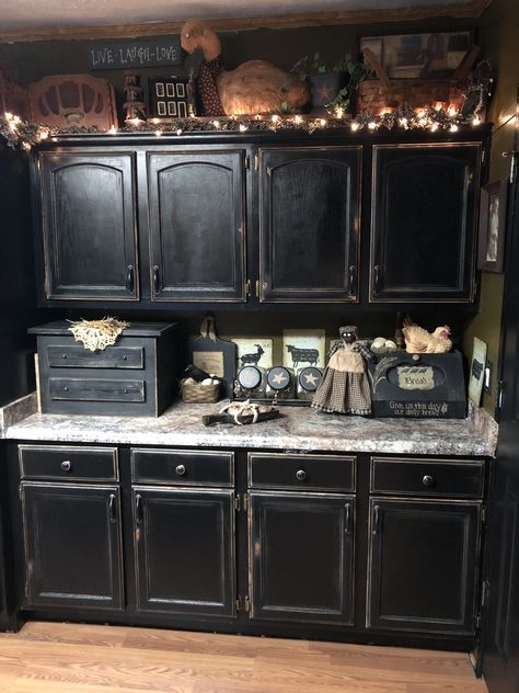 Black cabinets  Primitive style Primitive Kitchen Cabinets, Witchy Kitchen, Primitive Bathrooms, Primitive Homes, Black Kitchen Cabinets, Black Cabinet, Kitchen Cabinets Decor, Kitchen Cabinet Styles, Primitive Kitchen