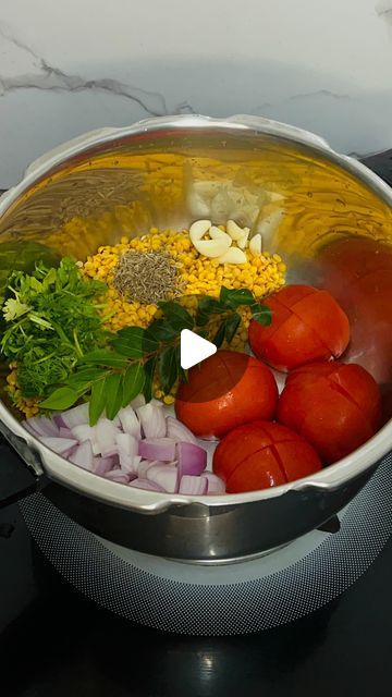 Vidya Ramachandra on Instagram: "Let’s make my favorite version of South Indian Sambar! . Ingredients: Toor dal – 1 Cup Onion – 1 Large sized Garlic – 6 Cloves Tomato – 2 Large sized  Fresh coriander – 1/4 Cup Curry Leaves – 1 Sprig Jeera – 1 Spoon . Step 1: In a pressure cooker, combine Toor dal, onion, garlic, tomatoes, fresh coriander, curry leaves, jeera, add water and cook for 3-4 whistles. Set aside. Step 2: In a blender, add 1/4 cup of coconut, a lemon-sized piece of tamarind, 1/4 cup of fresh coriander & grind into a fine paste and set aside. Step 3: In a kadai (pan), add drumsticks, potatoes, and salt. Boil for 7-8 minutes, then add chopped brinjal and cook for another 3-4 minutes before turning off the heat. Step 4: Mash the cooked ingredients from the pressure cooker, then add s Sambar Recipe Indian, Sambar Recipe, Toor Dal, Tomato Curry, Tastemade Recipes, Carrots And Potatoes, Curry Leaves, Pressure Cooker, 1 Cup