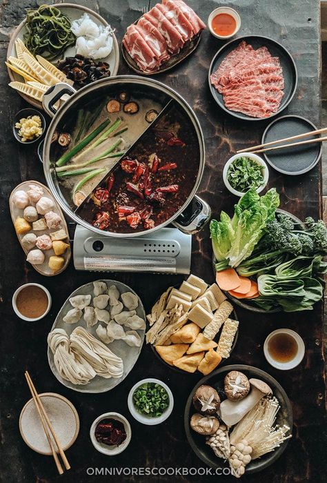 The ultimate Chinese hot pot guide that explains the different types of broth, dipping sauces, ingredients, and equipment, plus all you need to know to host a successful hot pot party. #ChineseNewYear Hot Pot Party, Chinese Fondue, Chinese Hot Pot, Hot Pot Recipe, Thanksgiving Appetizer Recipes, Mapo Tofu, Thanksgiving Dinner Menu, Dipping Sauces, Turkey Recipes Thanksgiving