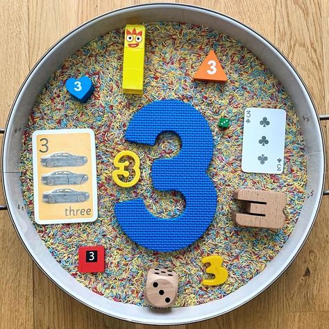 What Shall We Play Today? on Instagram: “Number 3 sensory bin  Henry loves the number two, then skips to 5, 6, 7! So the #oursensoryfairytales prompt of 3 was perfect for us. 3️⃣…” Tuff Tray Number Activities, Numbers Sensory Bin, Number 3 Activities For Toddlers, Number Tuff Tray, Number Sensory Bin, Playgroup Ideas, Instagram Number, Sensory Tubs, Sensory Learning