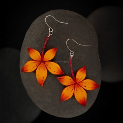 Fall is around the corner! “Maple Leaf” earrings are inspired by the simple beauty of autumn 🍁, reflecting the rich, warm colors of real maple leaves. Wearing these earrings is like carrying a piece of the season with you, reminding you of crisp walks through falling leaves 🍂 and the cozy comfort of fall. Each pair is lovingly crafted, capturing the essence of nature’s change and warmth. Ready to embrace autumn? Claim your pair today! 🍁✨ . . #mapleleafearrings #paperquilling #autumninspired #... Quilled Earrings, Fall Lovers, Paper Quilling Jewelry, Quilling Jewelry, Earrings Fall, Quilling Paper Craft, Paper Earrings, Fall Theme, Paper Jewelry