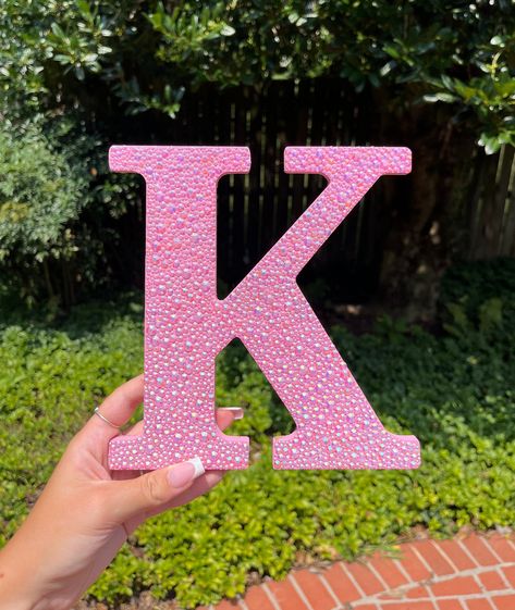 8 inch wooden letter "K" bedazzled with light pink colored rhinestones. Perfect for home décor, gifts, or personalizing your space with a bit of glamour! Pink Sorority Letters, Disco Sorority Letters, Cute Sorority Letters, Sorority Letters Painted Wooden, Decorated Sorority Letters, Letter Painting Ideas Wooden, Painted Letters Diy, Sorority Letters Painted, Big Picture Frames