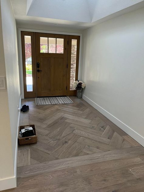 Herringbone Wood Foyer, Wood Look Tile Herringbone Pattern, Entryway Flooring Ideas Tile Herringbone, Entryway Herringbone Wood Floor, Entryway Floor Ideas Tile Entrance, Herringbone Tile Entryway, Herringbone Wood Floor Entryway, Entry Tile Floor Entryway, Herringbone Entryway