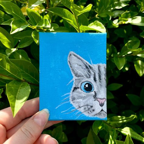 Here kitty kitty! 🐈‍⬛ This cute cat is an adorable little baby! And is live on my Etsy for £20! 🤭 ✨ LINK IN BIO ✨ If you like this style but want to see your cat on that canvas my commissions are open! So just send me a message 🐈 Let me know what you think in the comments! And what would you like to see me paint next? 🐱 Posca Painting, Tabby Cat Painting, Bright Blue Background, Here Kitty Kitty, Mini Easel, Painting Inspo, Kitty Kitty, Mini Paintings, Cat Painting