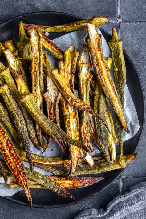 Looking for a healthy, crunchy snack? Try our Baked Okra Chips! Fresh okra is sliced, seasoned, and baked to perfection, creating a guilt-free snack that's packed with nutrients and flavor. The best way to eat okra! How To Make Okra Chips, Okra Chips Recipe, Freeze Dried Okra Recipe, Freeze Dried Okra, Dehydrate Okra, Dried Okra Recipe, Dehydrated Okra, Oven Roasted Okra, Okra Chips