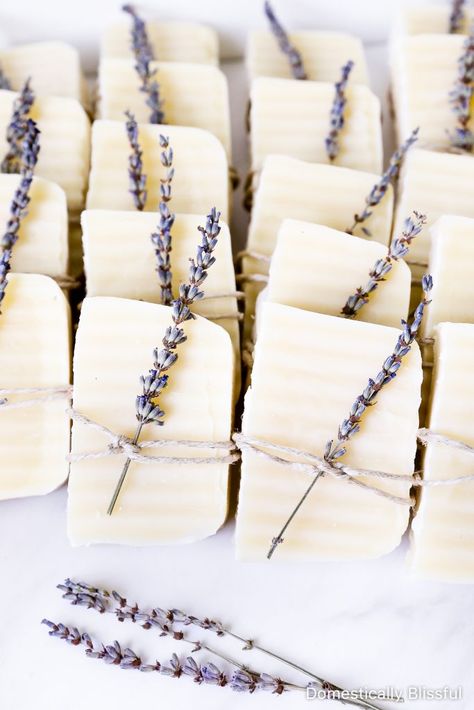 Lavender Soap Favors for a wedding shower or baby shower tied with twine and dried lavender stems. | Lavender wedding shower favors tied with dried lavender. | Bridal shower favors of soap. | Baby shower favor ideas. | Wedding shower favors inspiration. | From her shower to yours. | Dried lavender stem tied with twine on lavender soap. | Simple wedding shower favor. | Easy bridal shower favor. | DIY wedding shower favor ideas. Easy Bridal Shower Favors, Wedding Shower Favors Diy, French Bridal Showers, Domestically Blissful, Pearl Bridal Shower, Lavender Baby Showers, Lavender Lemonade, Green Baby Shower, Wedding Shower Favors