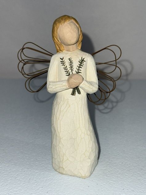 The Willow Tree Angel of Remembrance figurine, designed by Susan Lordi for Demdaco in 2001, stands at 5 inches tall and is made of beige resin with a matte finish. This medium-sized figurine depicts an angel and is part of the Willow Tree collection. It is an original piece from the 21st Century and is unboxed, featuring a tag. The figurine has a traditional style and is a meaningful item for Remembrance Day or as a gift for teens, adults, or girls who appreciate angel-themed decor. No original box Willow Tree Angels, Tree Angel, Remembrance Day, Willow Tree, Themed Decor, An Angel, Gifts For Teens, 21st Century, Traditional Style