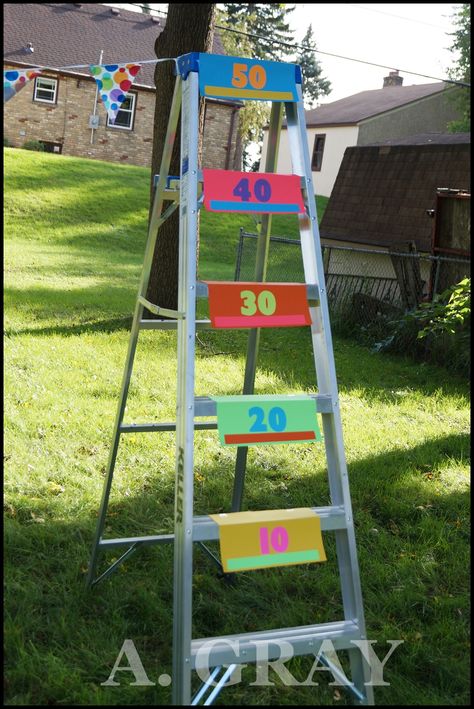 DIY Backyard Ladder Toss Game Ladder Bean Bag Toss, Diy Toss Game, Ladder Toss Game Diy, Block Party Games, Backyard Games Diy, Ladder Game, Ladder Toss, Circus Activities, Backyard Party Games