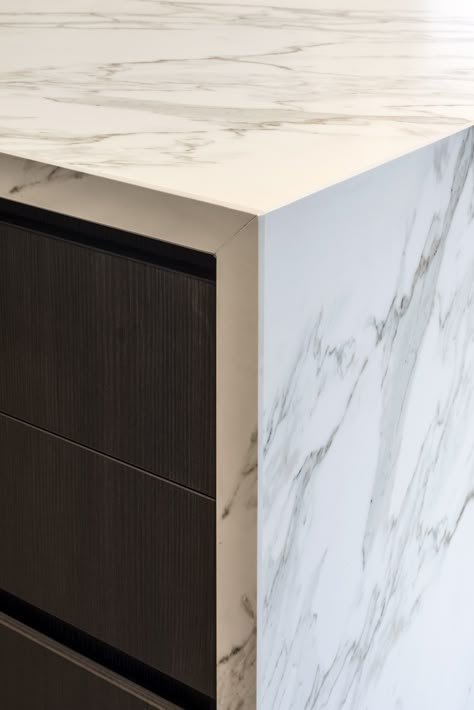 Close up of a Neolith Calacatta island bench with beautiful bookmatching. Installation by @pazstone_  @rachellewisphotography  #cdkstone #neolith #neolithcalacatta #sinteredcompactsurface #extraordinarysurface #scratchresistant #stainresistant #heatresistant #coldresistant #resistanttouvfading #designinspiration #lowmaintenance #greyandwhite #marblelook #slabs #bookmatching Stone Waterfall Kitchen Island, Stone Benchtop Kitchen, Neolith Calacatta, Calacatta Marble Kitchen, Kitchen Platform, Penthouse Kitchen, Marble Kitchen Counters, Waterfall Counter, Waterfall Island Kitchen