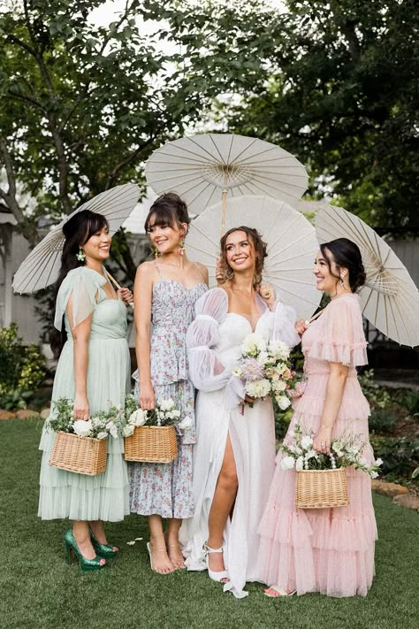 If you are planning a garden wedding and are looking for bridesmaid outfit ideas, save this photo filled with bridesmaid inspiration! From the bridesmaid basket bouquets to the mixed bridesmaid dresses and parasol umbrellas, these bridesmaids were set for this garden wedding in Georgia.Kim Hymes Photography | Atlanta wedding photographer Mix Matched Bridesmaid Dresses, Bridesmaid Basket, Auburn Wedding, Bridesmaid Baskets, Pastel Bridesmaids, Mix Match Bridesmaids, Parasol Wedding, Bright Wedding Colors, Bridesmaid Photoshoot