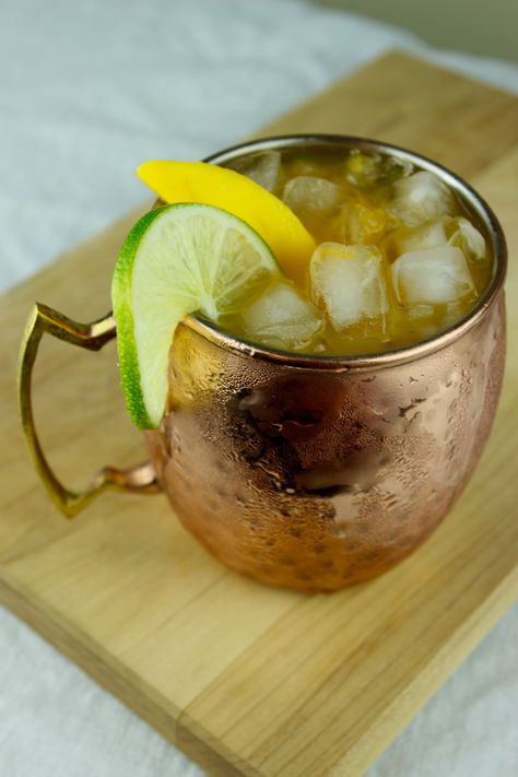 A refreshing vodka summer drink that will be a smash hit at your next party. Mango Moscow Mule, Mango Mule Recipe, Mango Moscow Mule Recipe, Mango Mule, Summer Vodka Drinks, Moscow Mule Drink Recipes, Mango Cocktail, Moscow Mules, Moscow Mule Recipe