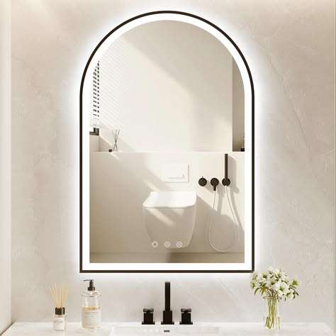 PRICES MAY VARY. 【Stylish Black Frame】-Black arched light up bathroom mirror with a sleek and modern design, modern backlit mirror bathroom will add a touch of elegance to any bathroom decor. The black aluminum framed lighted bathroom mirror not only adds a stylish touch but also ensures durability and shatterproof qualities. 【Super Bright Front and Backlight】- Enhance your bathroom experience with the OUMUSU black bathroom mirror with high-lumen IP54 waterproof LED strips, it is designed to provide you with a clear and bright reflection, making your daily grooming routine a breeze. Over 50,000 hours of service life, safe and durable. 【3 Colors & Dimmable & Anti-fog】- Arched bathroom vanity mirror with lights is dual-touch switch control. You can single-touch ON/OFF button to switch betwee Bathroom Mirrors With Lights In Them, Bathroom With Lighted Mirror, Black Mirror In Bathroom, Smart Bathroom Mirror, Mirror Lighting Bathroom, Arched Mirror Bathroom, Light Mirror Bathroom, Modern Bathroom Mirror Ideas, Backlit Mirror Bathroom