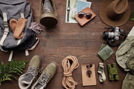 All you need for hiking by Pressmaster. Above view of backpack, rope, boots, compass, binoculars, hat, lantern and maps on wooden table, hiking flat lay #Sponsored #rope, #boots, #compass, #backpack Trading Ideas, Snow Accessories, Hiking Bag, Flat Lays, Studio Photoshoot, Flat Lay Photography, Outdoor Tools, Shooting Photo, Work Inspiration