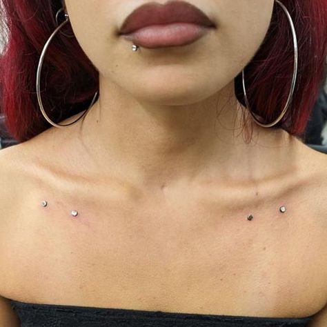 These dermal piercings are the perfect accessories to your anatomy 🤩  Dermal piercing by @shinysharpthings   Soho, Union Square, and Williamsburg  11AM-9PM 7 DAYS A/W🕘 WALK-INZ OR BOOK ONLINE..📕 TATTOOS & PIERCINGS, NO ATTITUDE, NO MISERABLE HOOPS TO JUMP THROUGH....🚫 WALK-INZ WELCOME OR BOOK ONLINE AT ⚔️livebytheswordtattoo.com⚔️ . . . . #livebythesword #dermalpiercings #microdermals #surfacepiercing #bodypiercing Dermal Hand Piercing, Dermals On Chest, Hand Dermal Piercing, Collar Bone Dermal Piercings, Lower Back Dermals, Body Dermals, Shoulder Piercing, Dermal Back Piercings, Cheekbone Dermal