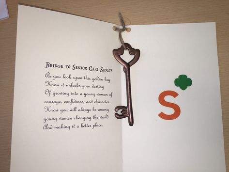 For a bridge to seniors gift, I adapted a bridge to seniors poem and attached a golden key to ivory card stock. Cadette To Senior Bridging Ceremony Ideas, Daisy Bridging Ceremony Gifts, Daisy To Brownie Bridging Certificate, Girl Scout Silver Award, Girl Scout Gifts, Girl Scout Mom, Girl Scout Junior Journey, Girl Scout Bridging, Girl Scout Troop Leader