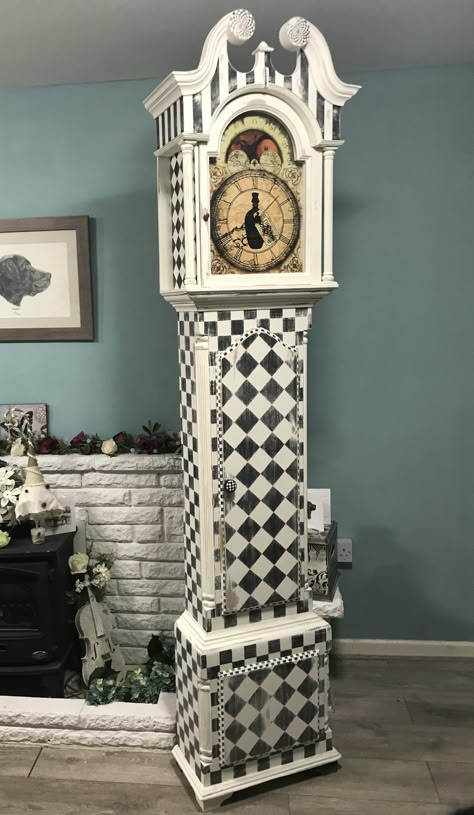 I’m obsessed with painting black and white squares and diamonds! I loved painting this Alice in Wonderland inspired grandfather clock! Shelving Ideas Garage, Garage Wall Design, Repurposed Grandfather Clock, Garage Shelving Ideas, Black And White Squares, Mackenzie Childs Diy, Grandmother Clock, Mackenzie Childs Inspired, Mckenzie And Childs