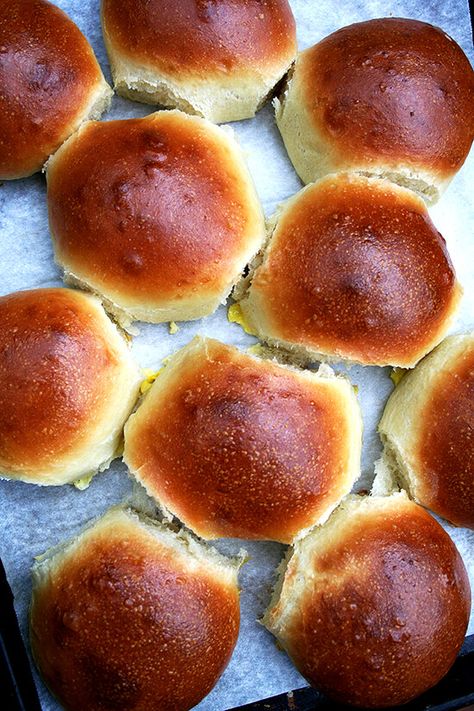 Before making the recipe for these hamburger buns, I had tried countless recipes for brioche, none of which produced the texture I had hoped for, all of which made me cringe at every step of the process — the amount of eggs and butter I wasted on unimpressive loaves is sinful. This recipe is it. Search no further. Yum. // alexandracooks.com Brioche Recipe, Hamburger Buns, Bun Recipe, Brioche Buns, Crumpets, Our Daily Bread, Burger Buns, Poppy Seeds, Warm Milk