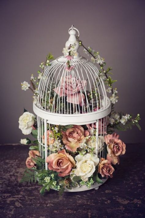 33 Elegant Birdcage Wedding Centerpieces #elegant #birdcage #wedding #centerpieces a white cage filled with fresh blooms and greenery Birdcage With Flowers, Cage Centerpiece, Birdcage Decor, Bird Cage Centerpiece, Cage Decor, Wedding Birds, Gift Table Wedding, Wedding Birdcage, Bird Cage Decor